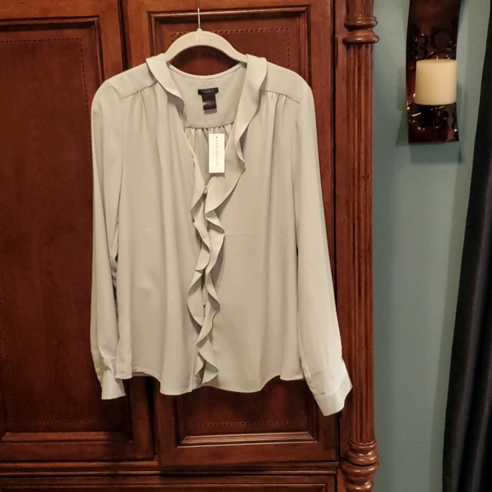 Green blouse with ruffle detail